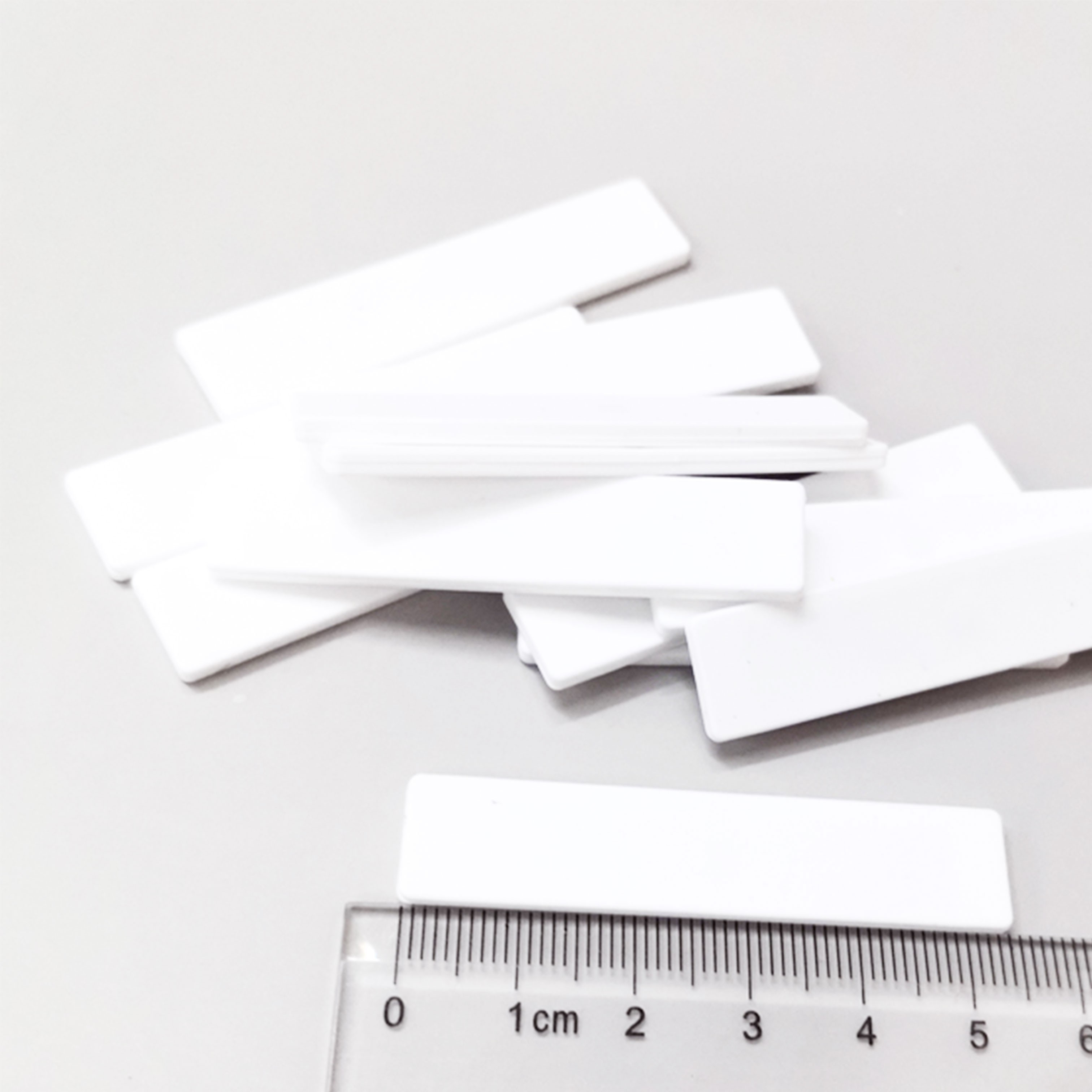 JT-F5512 860-960Mhz UHF Silicone RFID Laundry Tag